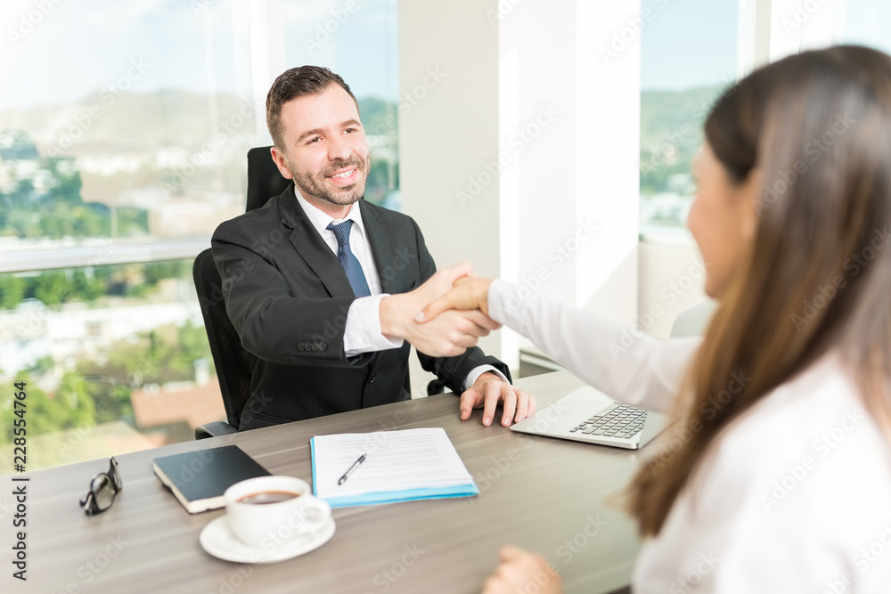 Recruiter Building Relationship With A Handshake During Interview Recruiter Building Relationship With A Handshake During Interview