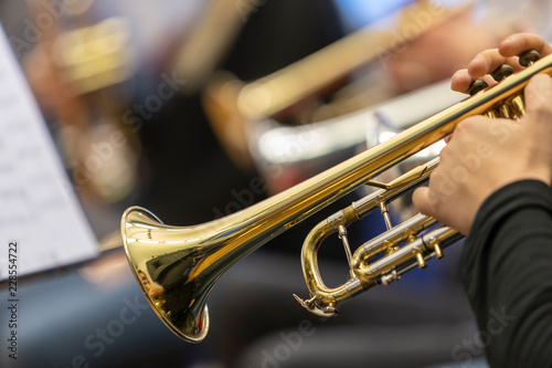 People playing the trumpet in rehearsal