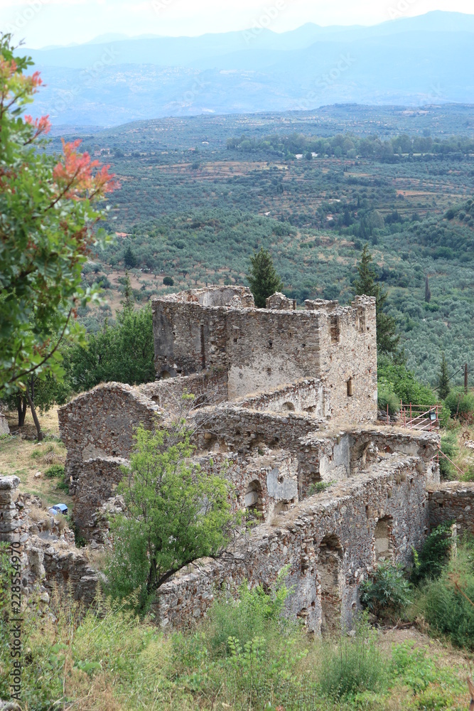 Ruins of old castle in abandoned city Mystras, Greece
