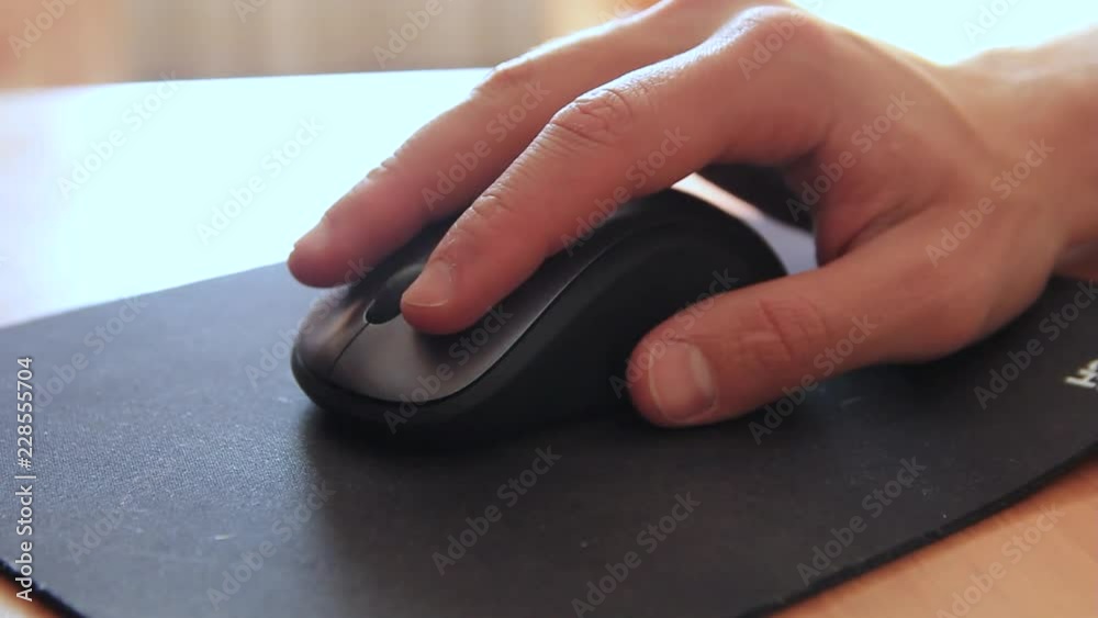 wireless mouse on the computer mat
