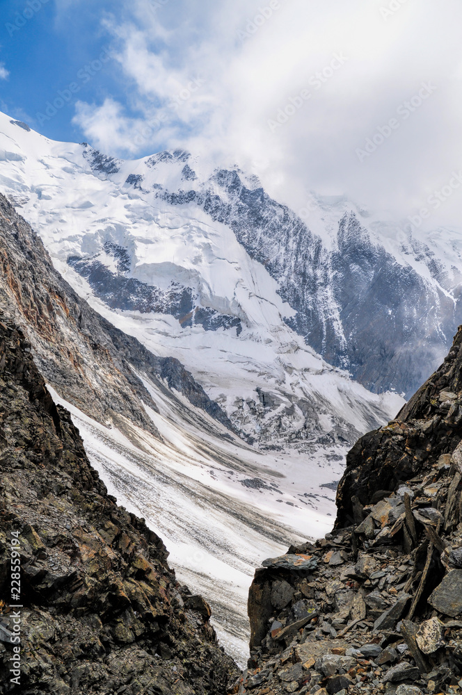View from the stone gorge to the old glacier at the base of the Mont Blanc