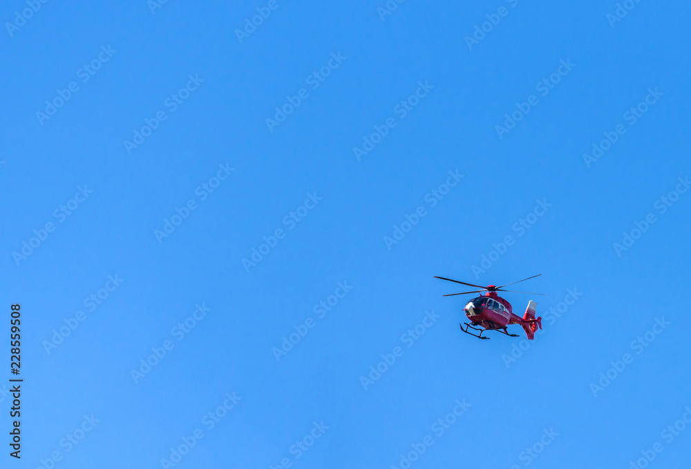 The helicopter flying The helicopter flying