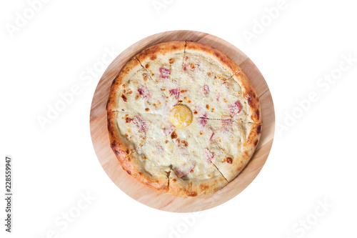 Carbonara pizza with sausage, ham, cheese and egg isolated on a white background.