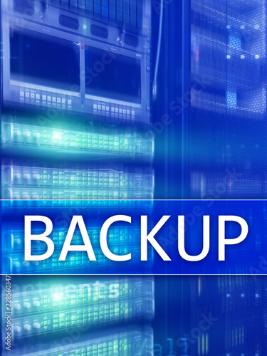 Backup button on modern server room background. Data loss prevention. System recovery.