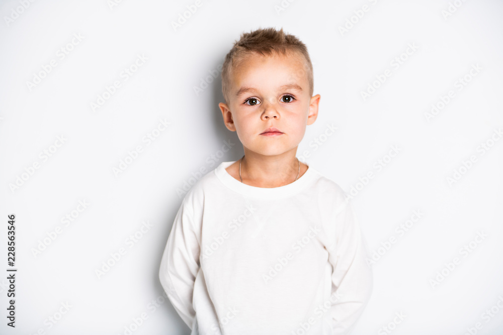 Close up portrait of cute little boy on background Close up portrait of cute little boy on background