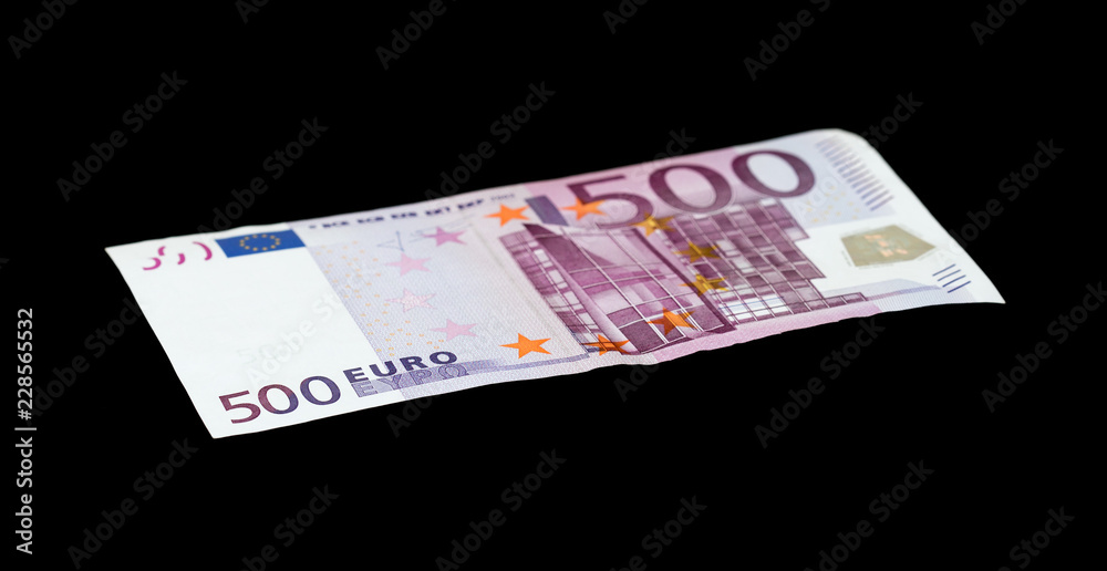five hundred euros on a black background five hundred euros on a black background