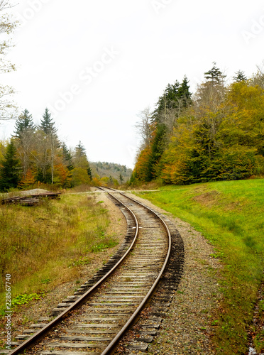 Railroad tracks on the top of a mountain, vertical