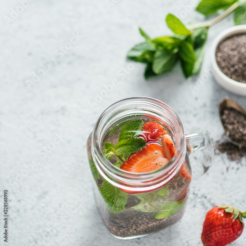 strawberry and mint chia water in mason jar