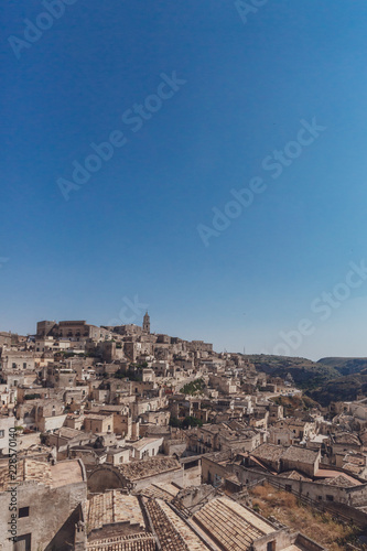 The sassi of Matera, Italy under blue sky