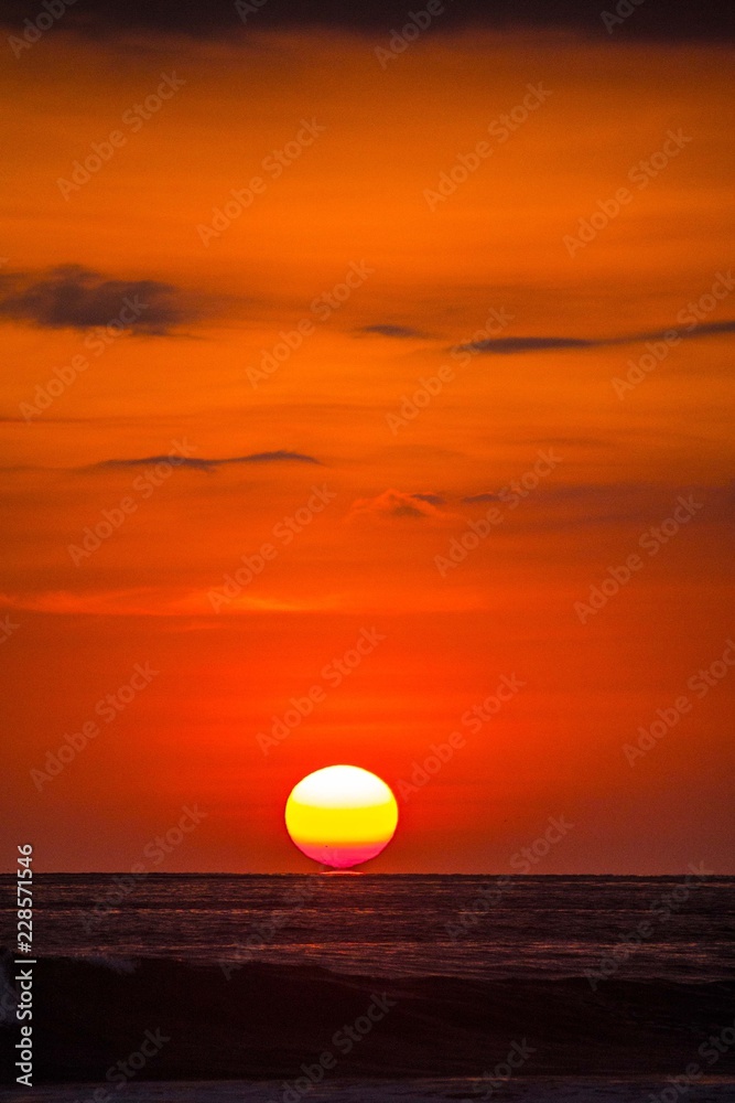 beautiful red sunset over the ocean.