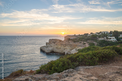 Summer sunset by Algar Seco on the Algarve, Portugal.