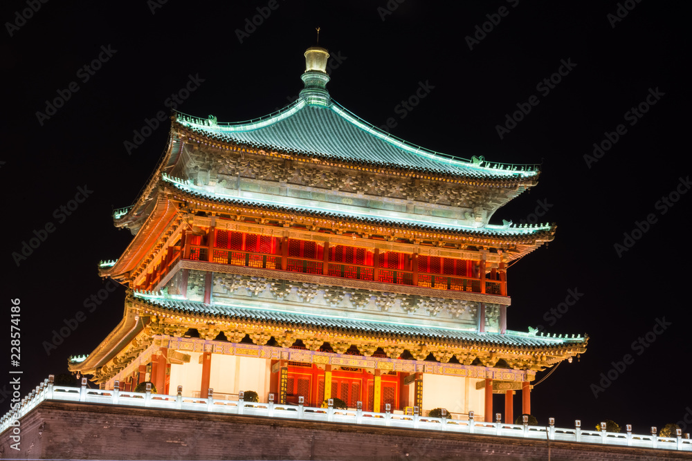 Beautiful illuminated chinese temple by night in Xi'An, China