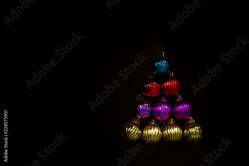 Color christmas balls on dark background