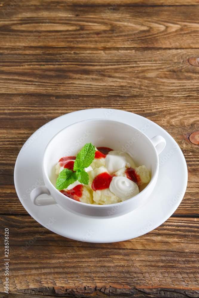 Healthe breakfast - lazy dumplings with sour cream and strawberry jam Healthe breakfast - lazy dumplings with sour cream and strawberry jam