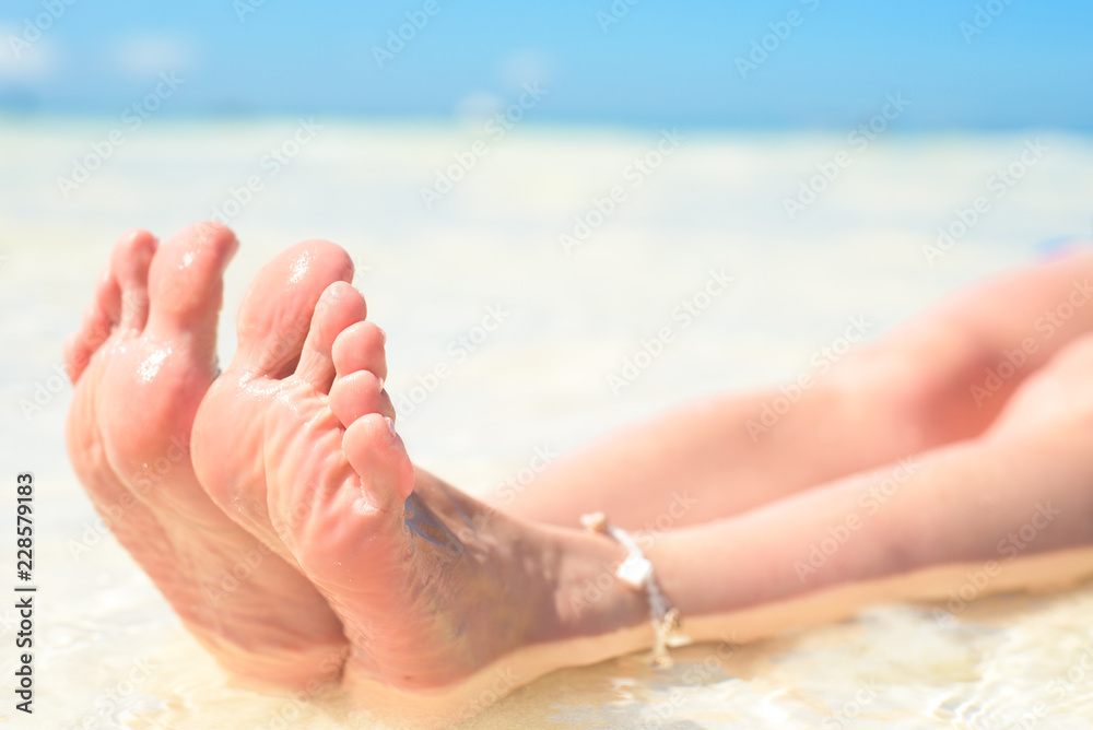 feet, sole of feet against the sea Pedicure and foot Spa.Care for the heels and soles of the feet. Foot massage. feet, sole of feet against the sea Pedicure and foot Spa.Care for the heels and soles of the feet. Foot massage.