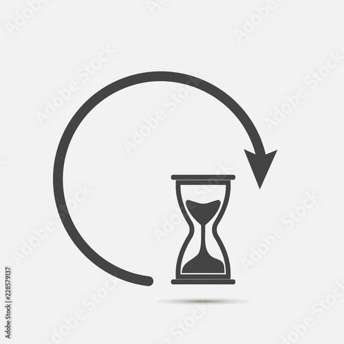 Sandglass clock icon on gray background. Flat image sandglass with shadow.  Layers grouped for easy editing illustration. For your design.