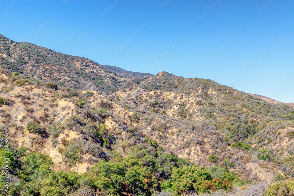 View of mountain slope for hiking on clear fall day