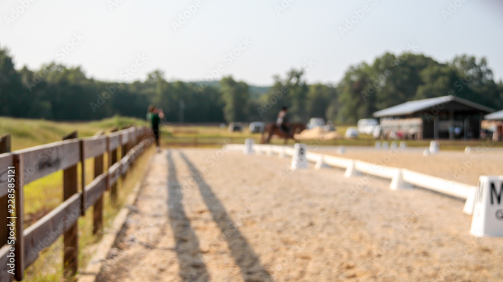 out of focus dressage ring
