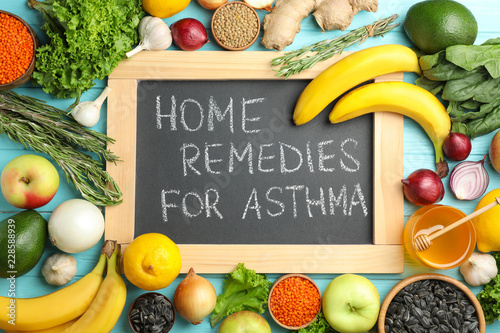 Natural products and board with text HOME REMEDIES FOR ASTHMA on color background, flat lay