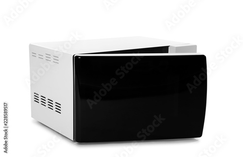 Open modern microwave oven on white background. Kitchen appliance