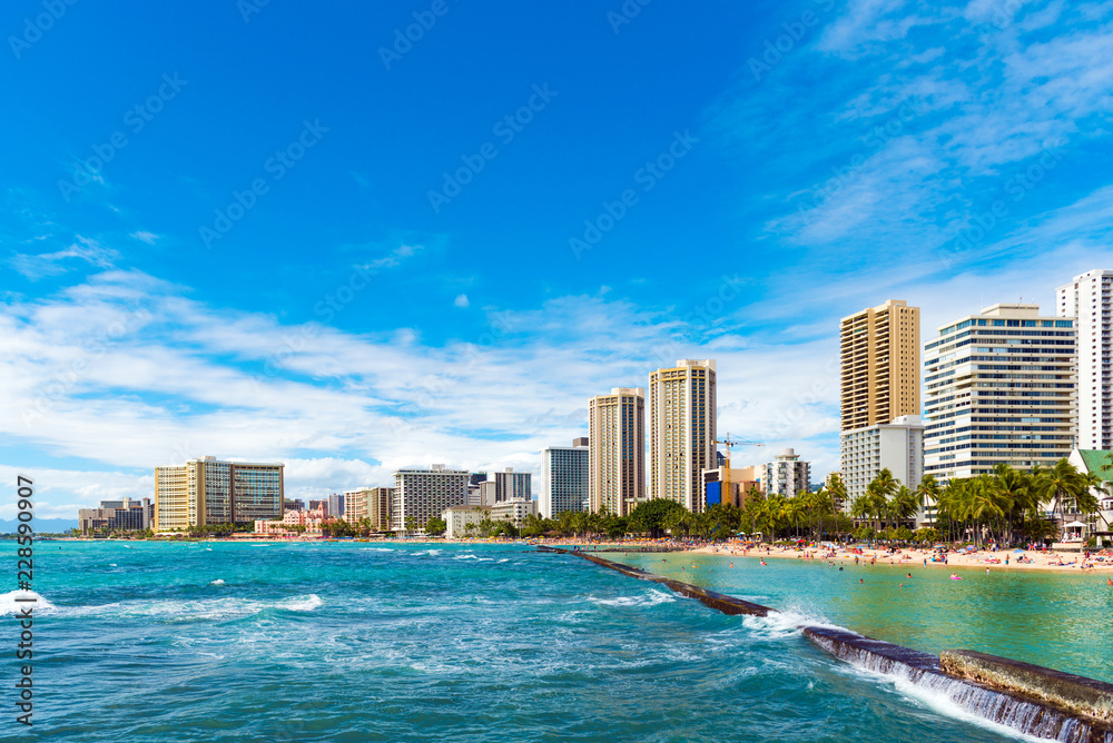 View of Waikiki beach in Honolulu, Hawaii. Copy space for text. View of Waikiki beach in Honolulu, Hawaii. Copy space for text.