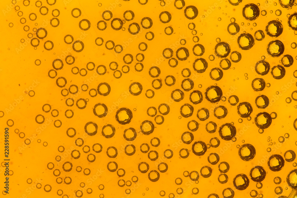 water drops on beer background water drops on beer background