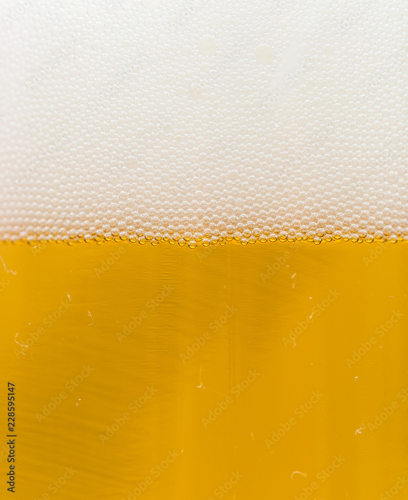close-up background of beer in the glass close-up background of beer in the glass