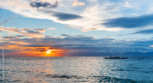 Sunset view of the sea in Moalboal, Cebu, Philippines. Copy space for text.