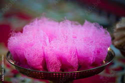 Close up Thai dessert in wedding ceremony. Sweets made from egg, syrup and coconut milk. Thai appetizer, local sweets. ingredient of dessert. photo