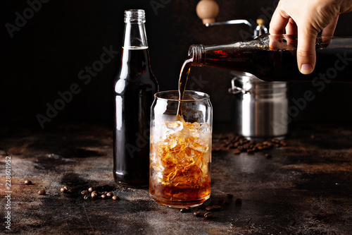 Obraz na płótnie Cold brew iced coffee in glass bottles