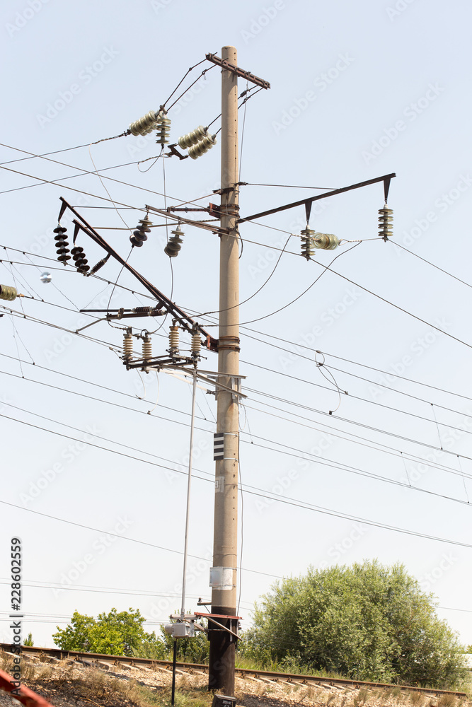 Railway electrification system. Overhead line wire over rail track. Power  lines. Photos | Adobe Stock