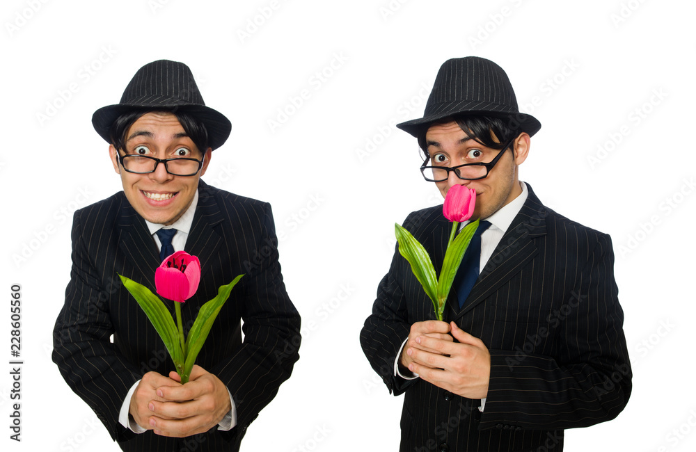 Young man in black costume with flower isolated on white Young man in black costume with flower isolated on white