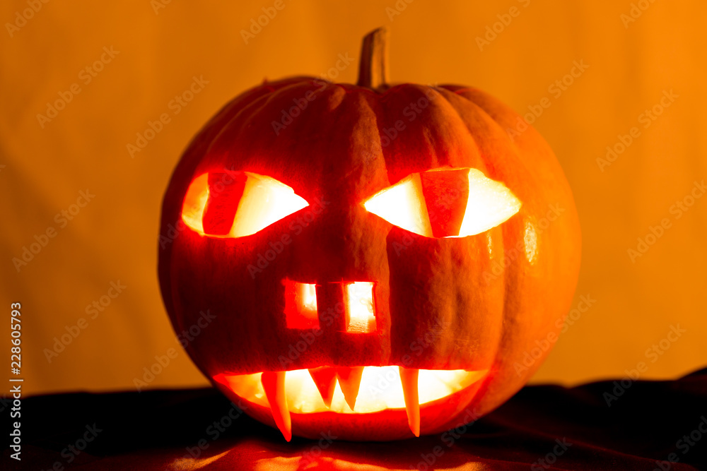 Fototapeta premium Halloween pumpkin isolated on black background