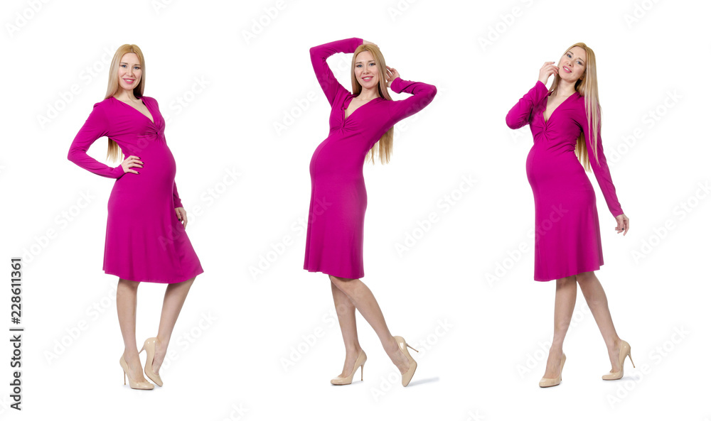 Pretty pregnant woman in pink dress isolated on white