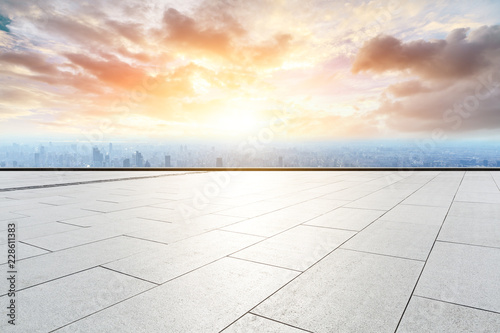 Panoramic skyline and buildings with empty concrete square floor