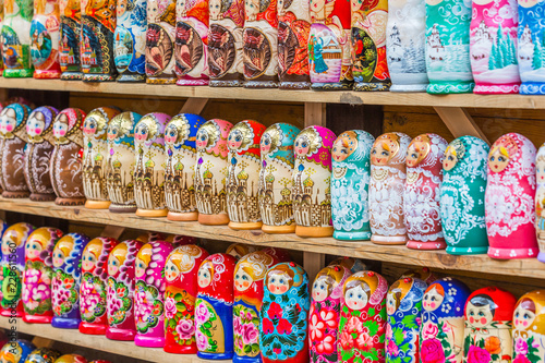 Colorful Russian Matryoshka Doll at the market, Matrioshka Babushkas Nesting dolls are the most popular souvenirs from Russia. © Kalyakan