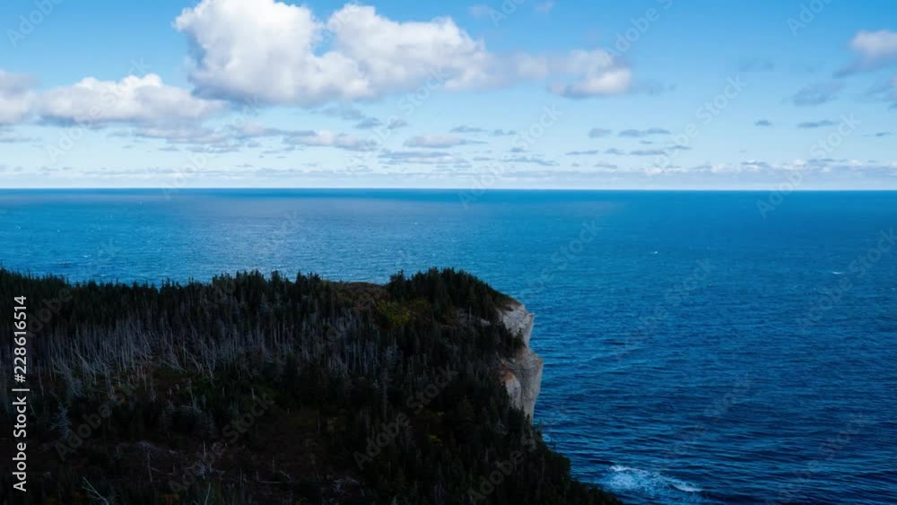 Evening time-lapse overlooking of Green Gaspesie Forest and Cap Forillon Evening time-lapse overlooking of Green Gaspesie Forest and Cap Forillon