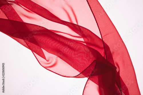 Abstract bright colorful fabric background in the form of a wave