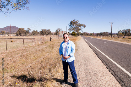 Outback Australia and its dry landscape with a single male looking for a lift!