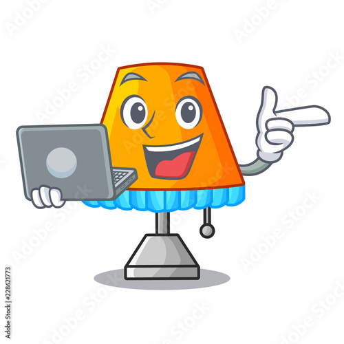 With laptop character table office lamp in indoor