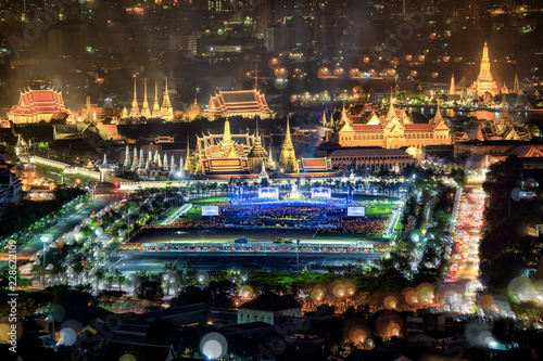 Fireworks on Father's day while King Bhumibol's body was living in as passed away Grand Palace Emerald Buddha city view skyline at night, Bangkok, Thailand.