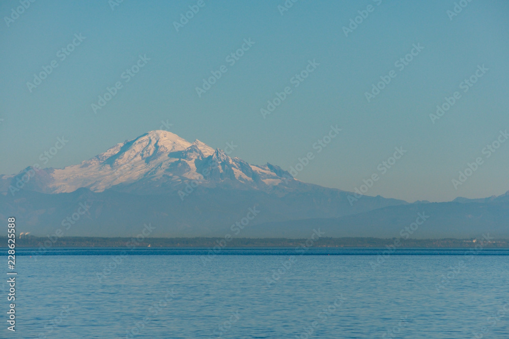 view of the mount baker by the sea near sunset