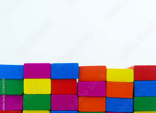 Arrangement of colorful wooden block on white background