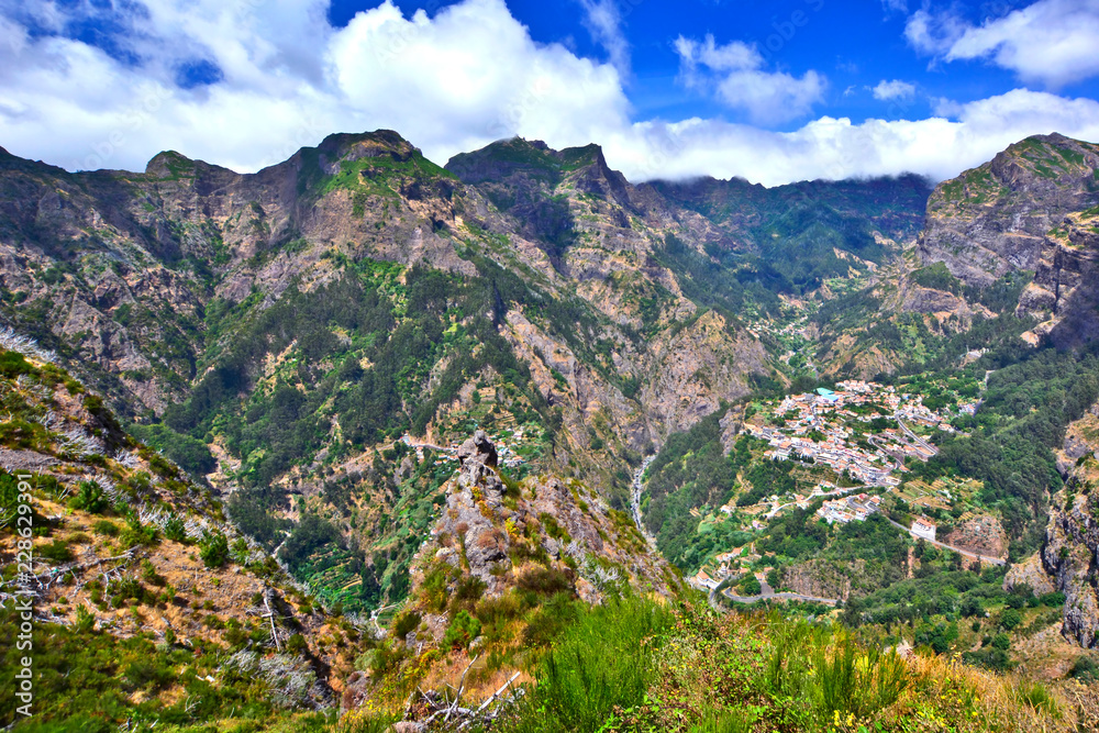 Fototapeta premium Valley of the Nuns, village Curral das Freiras surrounded with mountains, Madeira Island, Portugal 