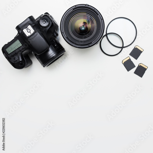 photography equipment and copy space over white table