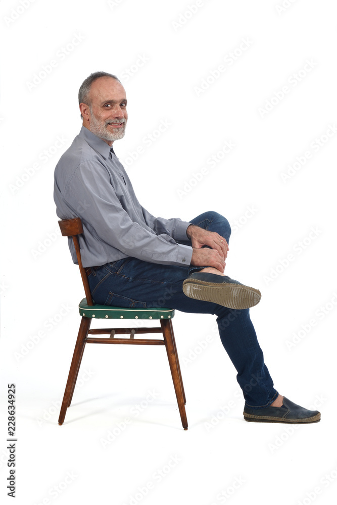 portrait of middle aged man sitting on white portrait of middle aged man sitting on white
