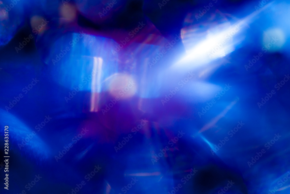 Blurred spots of blue light