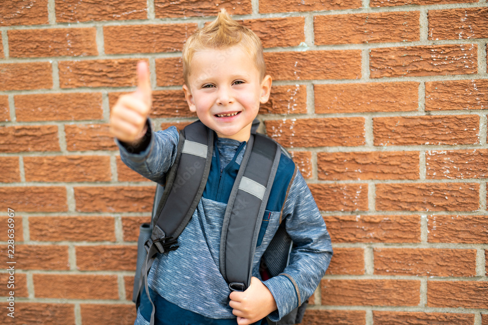A Back to school. Happy little boy with backpack A Back to school. Happy little boy with backpack