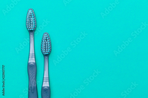 Flat lay composition with manual toothbrushes on color background  close up