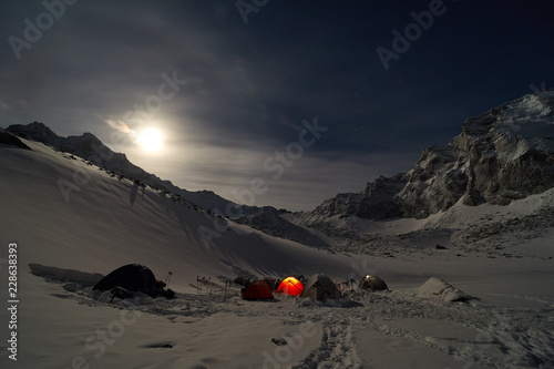 Climbing camp high in the mountains. Moonlight.